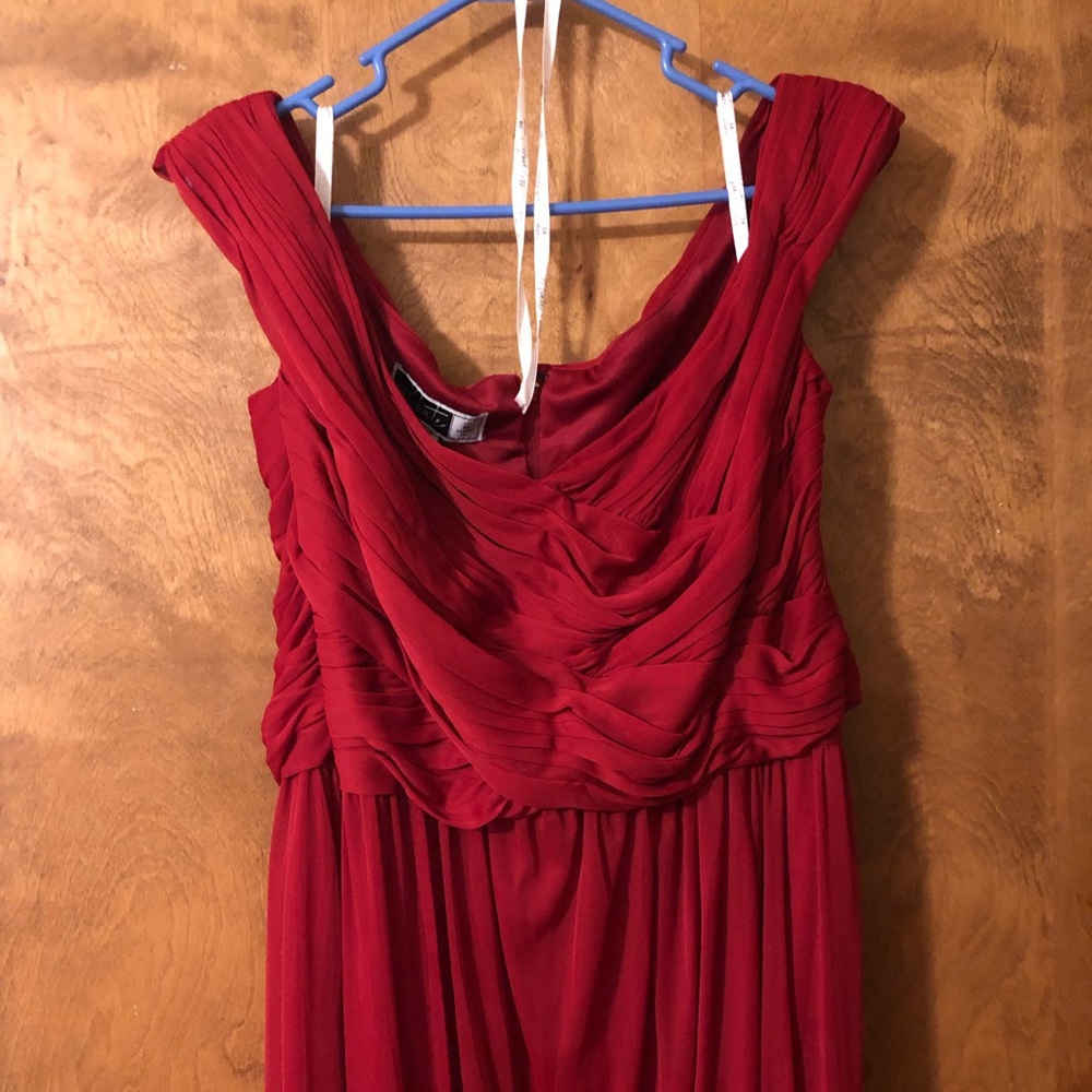 Celebrate formal dress maroon/wine in color. Size 24